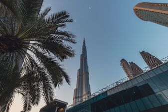 Burj Khalifa, palm tree and Moon